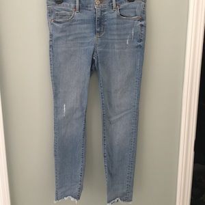 Mid rise LOFT jeans with short fringe hem